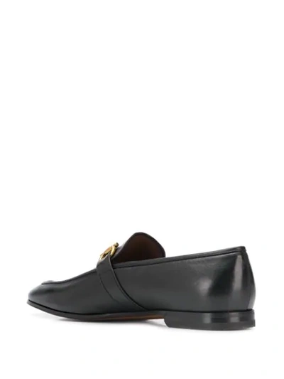 Shop Ferragamo Buckle Loafers In Black