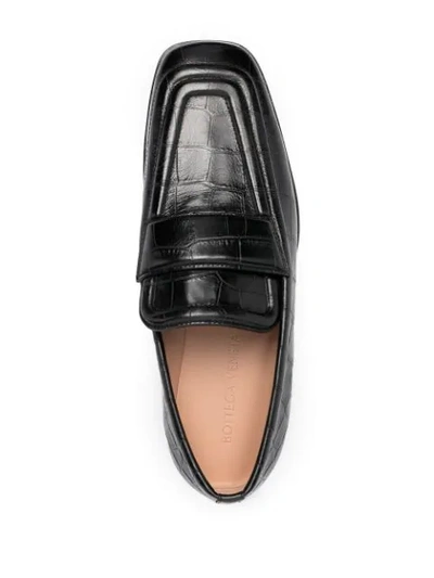 Shop Bottega Veneta Crocodile-effect Square Toe Loafers In Black