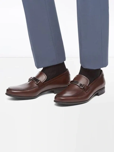 Shop Prada Logo Plaque Loafers In Brown