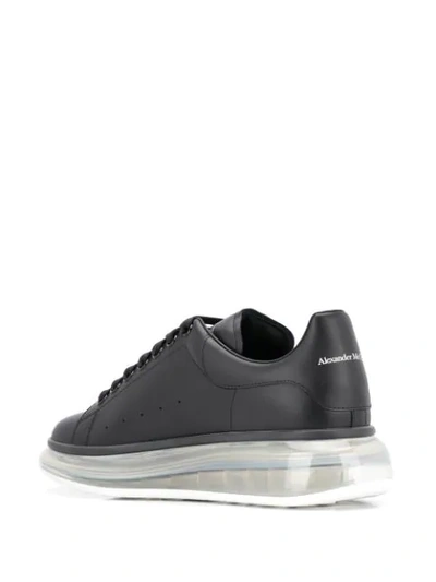 Shop Alexander Mcqueen Oversized Clear Sole Sneakers In Black