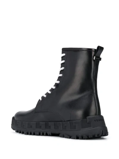 Shop Versace Ankle Boots In Black