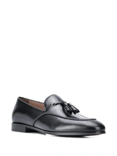 Shop Ferragamo Tassel Detail Loafers In Black