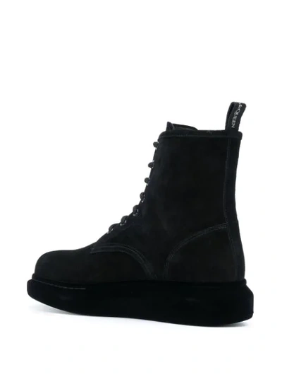 Shop Alexander Mcqueen Hybrid Lace-up Boots In Black