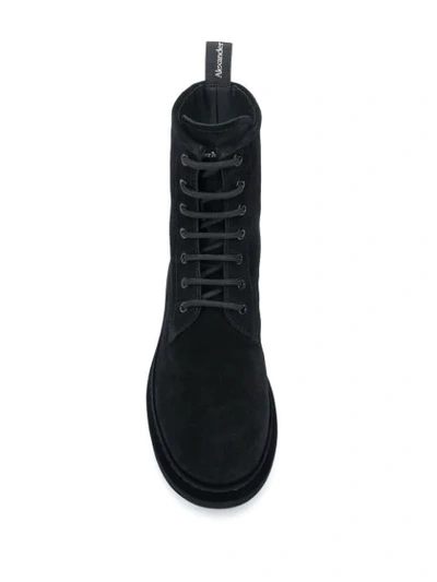 Shop Alexander Mcqueen Hybrid Lace-up Boots In Black