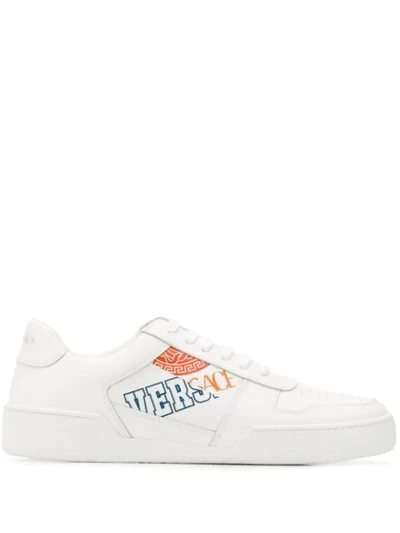 Shop Versace Logo Print Sneakers In White