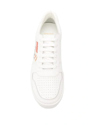 Shop Versace Logo Print Sneakers In White