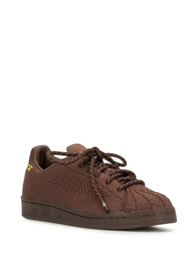 Shop Adidas Originals Primeknit Superstar Pharrel Williams Sneakers In Brown