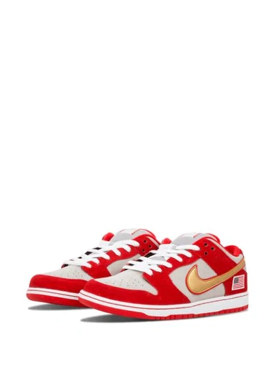 Shop Nike Dunk Low Pro Sb Sneakers In Red