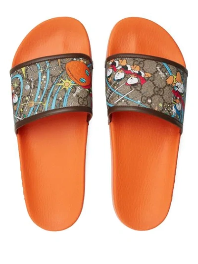 On the verge Easy to understand finished Gucci X Disney Pursuit Donald Duck Slide Sandal In Beige Ebony | ModeSens