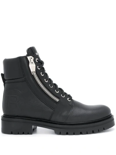 Shop Balmain Embossed Logo Combat Boots In Black