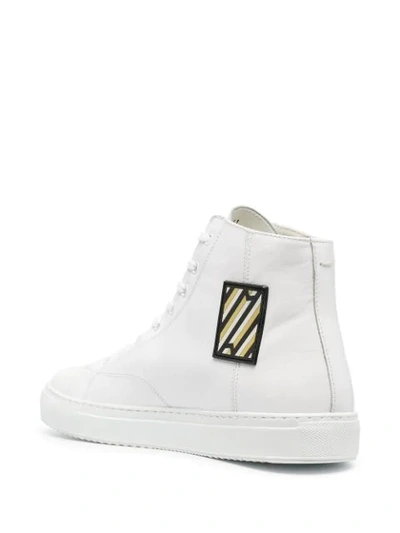 Shop Low Brand Graphic Patch High-top Sneakers In White
