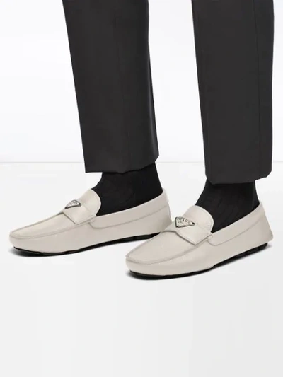 Shop Prada Logo Plaque Loafers In White