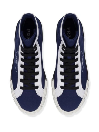 Shop Prada High-top Wheel Sneakers In Blue