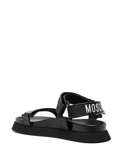 Shop Moschino Logo-tape Flat Sandals In Black