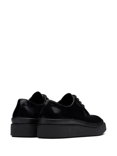 Shop Prada Leather Derby Shoes In Black