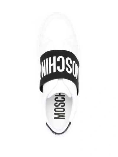 Shop Moschino Logo Print Slip-on Sneakers In White