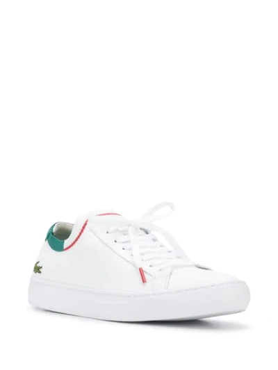 Shop Lacoste Knitted Style Embroidered Logo Detail Sneakers In White