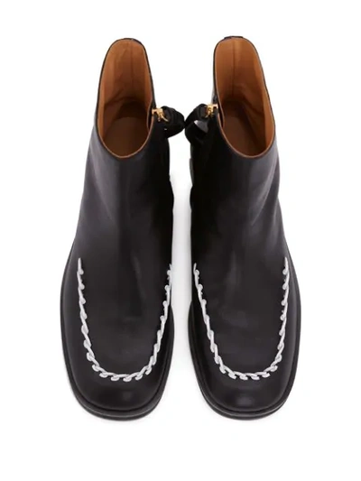 Shop Jw Anderson Contrast Stitch Detail Ankle Boots In Black