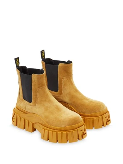Shop Fendi Chunky Chelsea Boots In Yellow