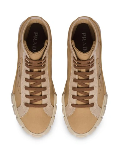 Shop Prada High-top Wheel Sneakers In Neutrals