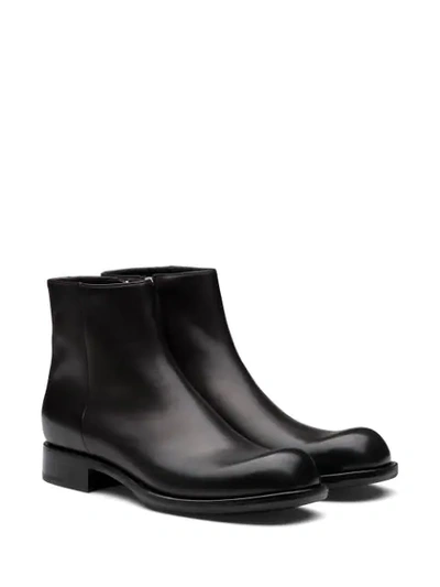 Shop Prada Zip-fastening Ankle Boots In Black