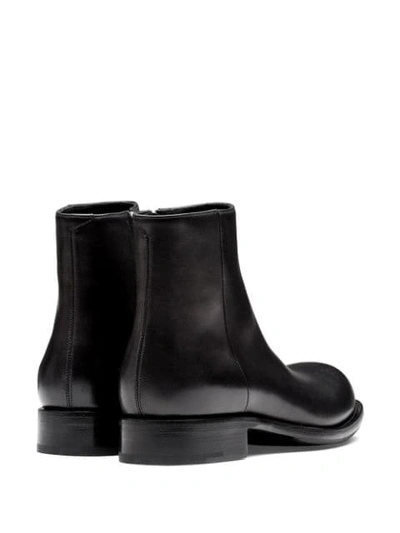 Shop Prada Zip-fastening Ankle Boots In Black