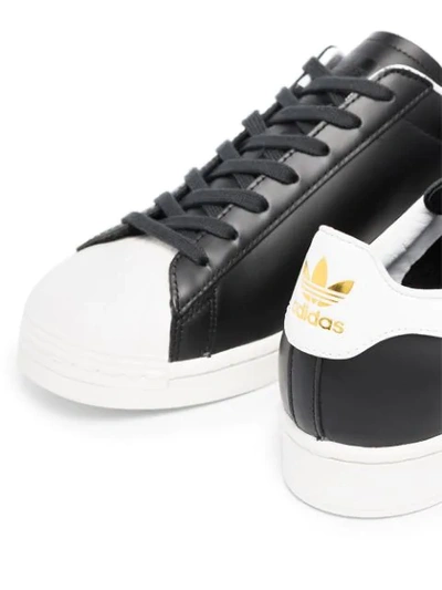 BLACK AND WHITE SUPERSTAR LEATHER SNEAKERS
