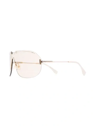 Shop Fendi Mono-frame Sunglasses In Gold