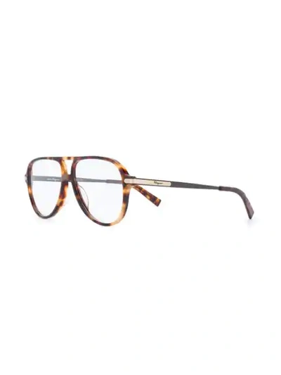 Shop Ferragamo Aviator Frame Glasses In Brown