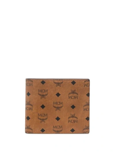 Mcm Small Monogram-print Bi-fold Wallet In Brown
