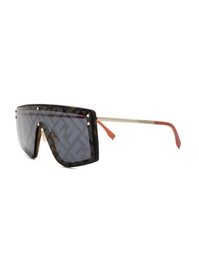 Shop Fendi Monogram Print Sunglasses In Brown