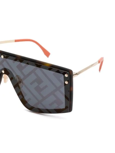 Shop Fendi Monogram Print Sunglasses In Brown