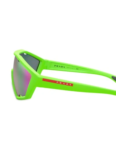 Shop Prada Linea Rossa Sunglasses In Green