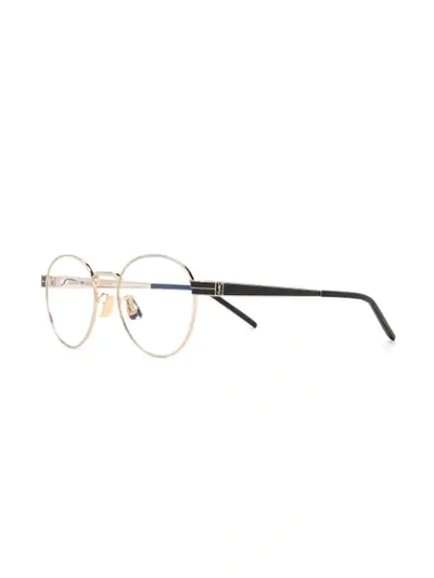 Shop Saint Laurent Round Frame Glasses In Gold