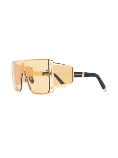 Shop Balmain Wonder Boy Sunglasses In Gold