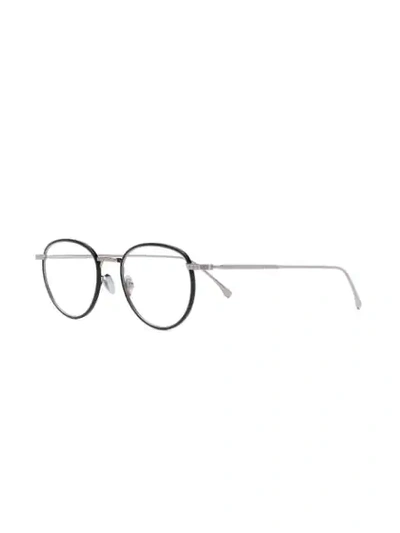 Shop Lacoste Round Framed Glasses In Black