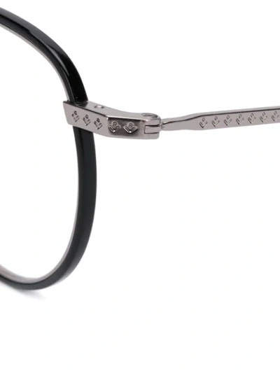 Shop Lacoste Round Framed Glasses In Black