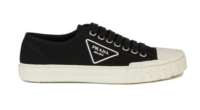 Shop Prada Sneakers In Nero+avorio