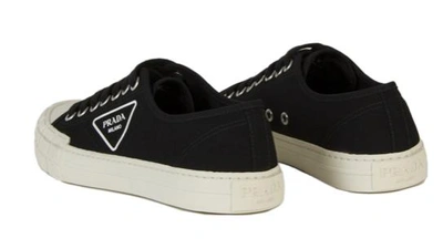 Shop Prada Sneakers In Nero+avorio