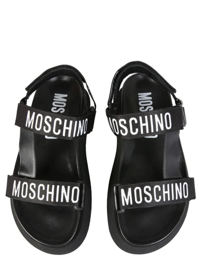 Shop Moschino Sandals With Logo Tape In Black