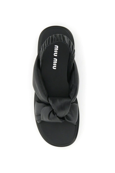 Shop Miu Miu Padded Nappa Sandals In Nero