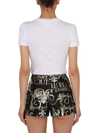Shop Versace Jeans Couture T-shirt With Metallic Logo In White