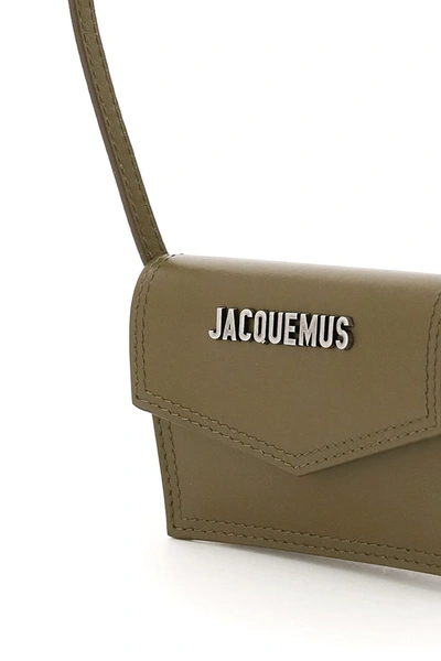 Shop Jacquemus Le Doors Azur Micro Crossbody Pouch In Dark Khaki
