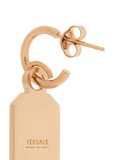 Shop Versace Charm Drop Earrings In Gold