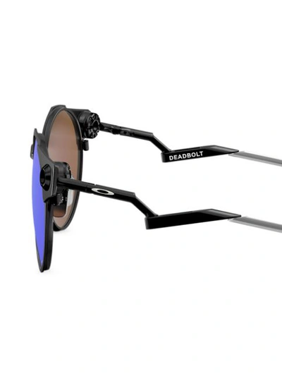 Shop Oakley Deadbolt Round Frame Sunglasses In Black