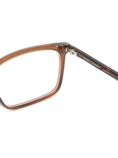 Shop Saint Laurent Rectangle Glasses In Brown