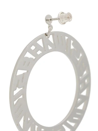 Shop Misbhv Logo Plaque Hoop Earrings In Silver