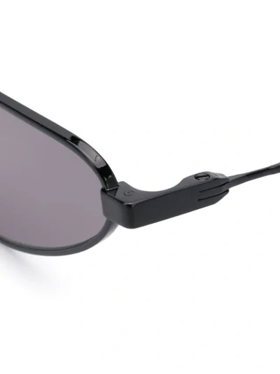 Shop Mcq By Alexander Mcqueen Narrow Tinted Sunglasses In Black