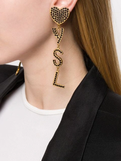 Shop Saint Laurent Crystal-embellished Logo Pendant Earrings In Gold