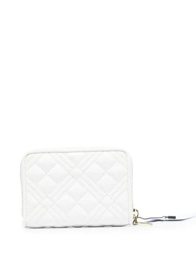 Shop Love Moschino Quilted Zip Wallet In White